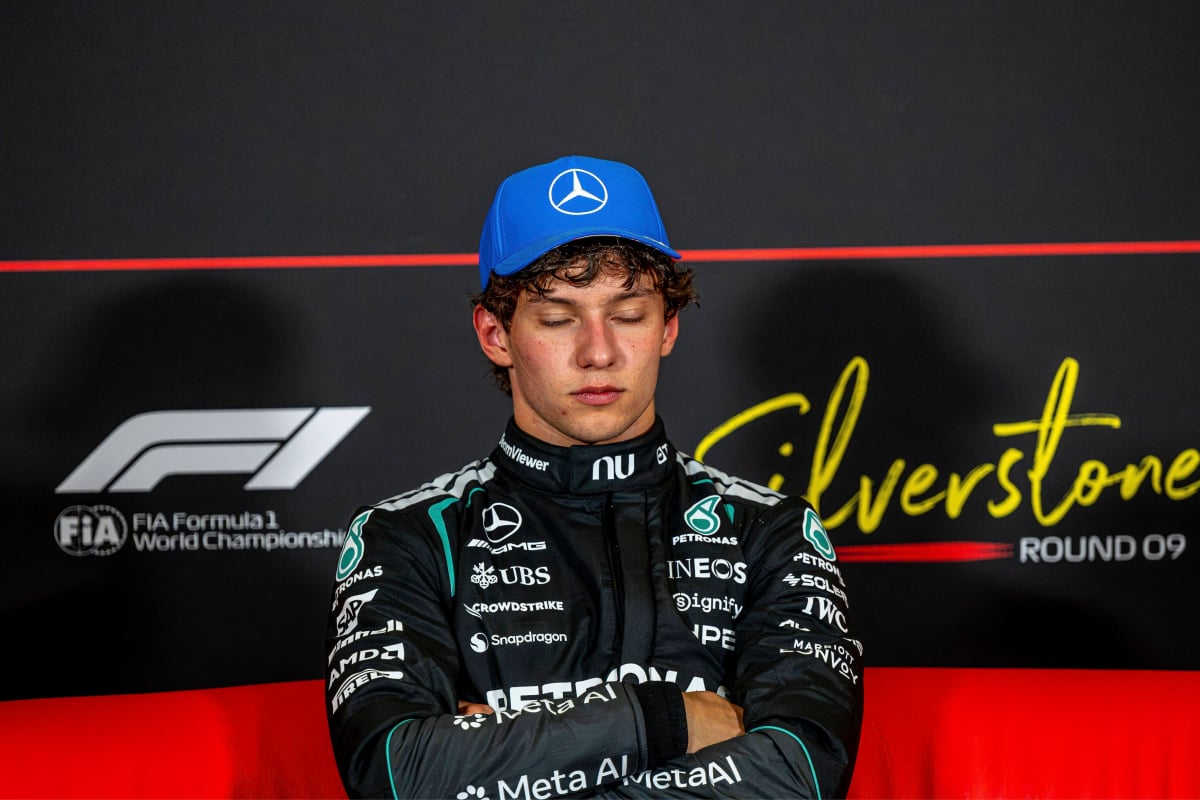 Antonelli with his eyes shut and arms crossed on FIA press conference sofa at British GP