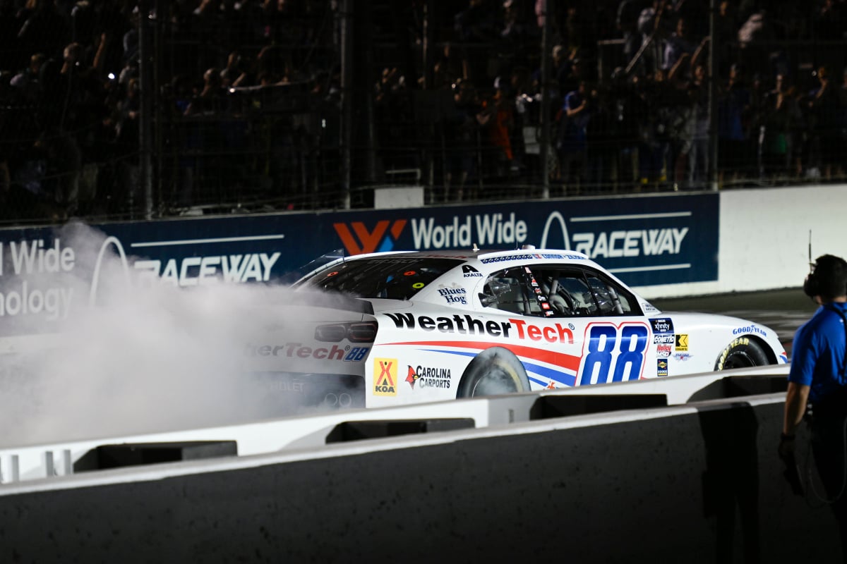 An image of NASCAR driver Connor Zilisch celebrating his win at Gateway