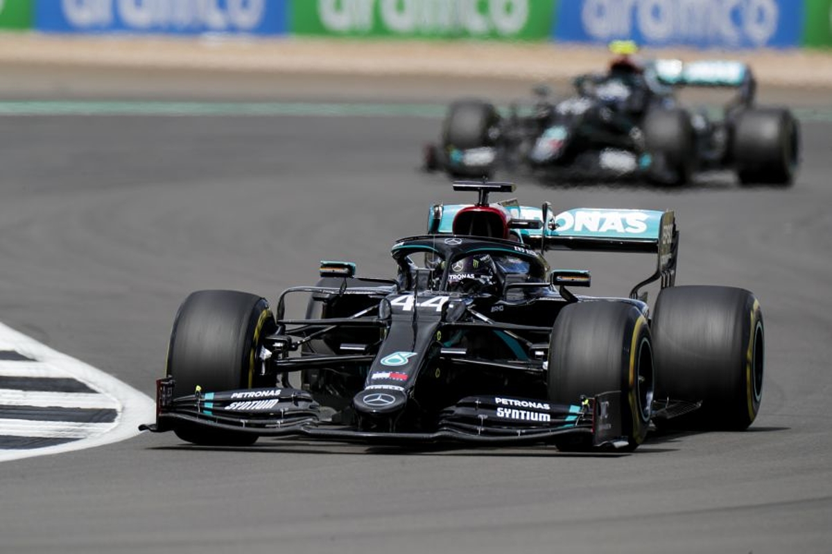 Hamilton survives late tyre puncture to claim seventh British GP win