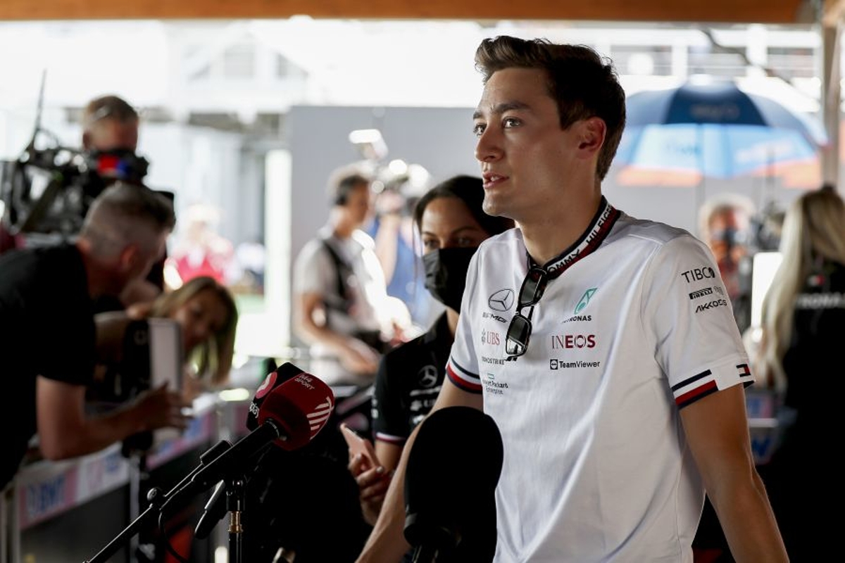Russell doing "wheelies" around Monaco in super-stiff Mercedes
