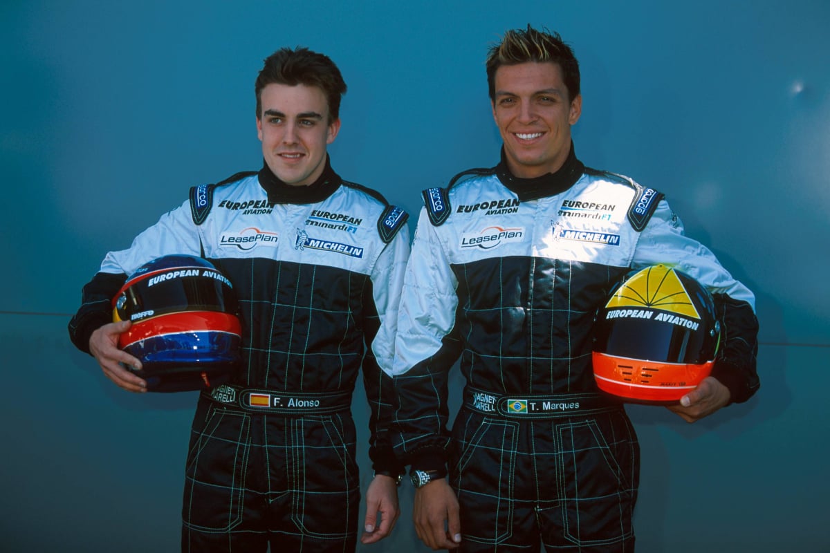 Fernando Alonso stands with Tarso Marques at a Minardi 2001 launch