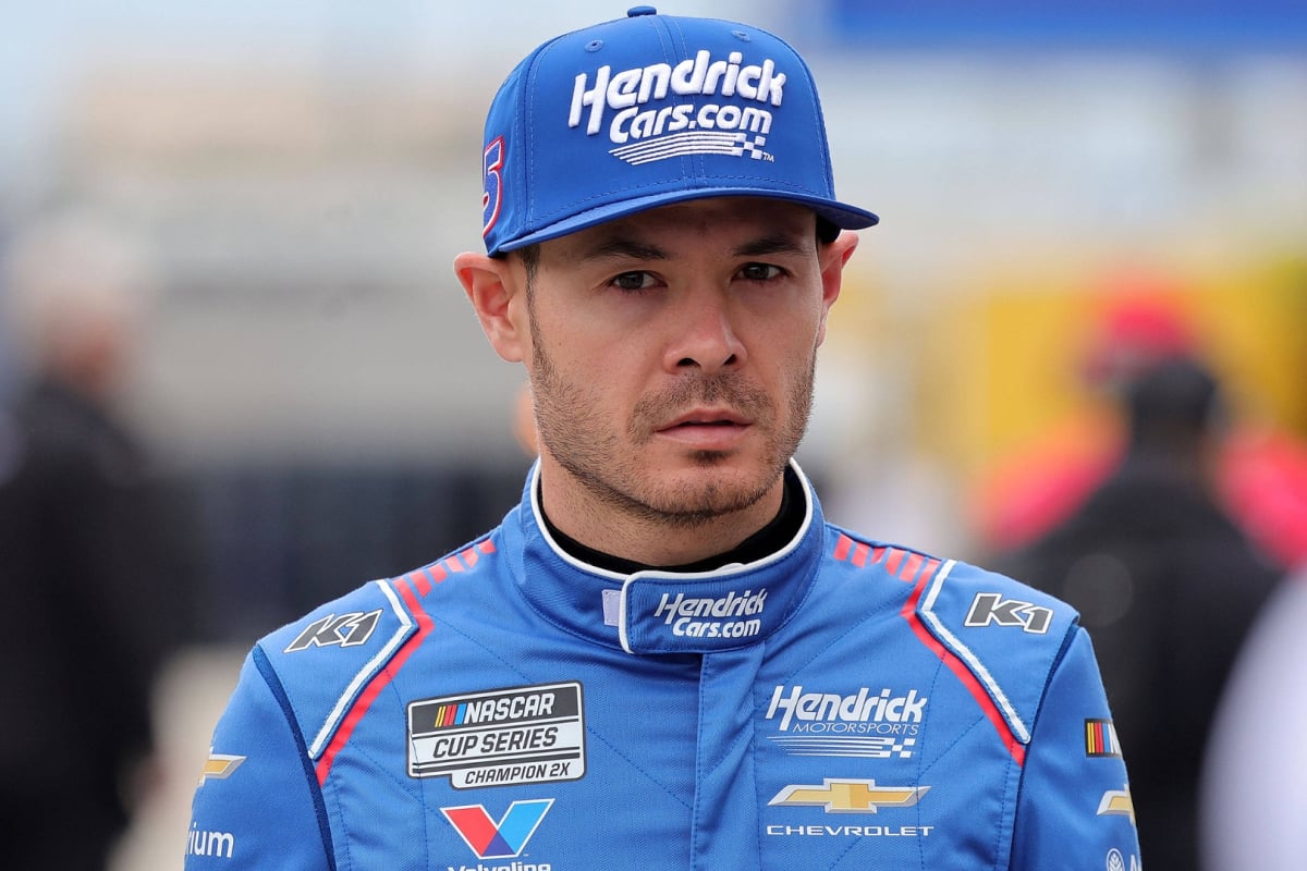 An image of Hendrick Motorsports NASCAR driver Kyle Larson looking unhappy on pit road