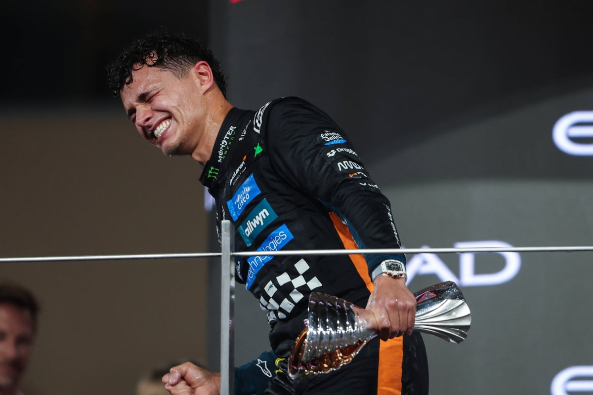 Lando Norris celebrated his F1 title win on the podium at the Abu Dhabi GP