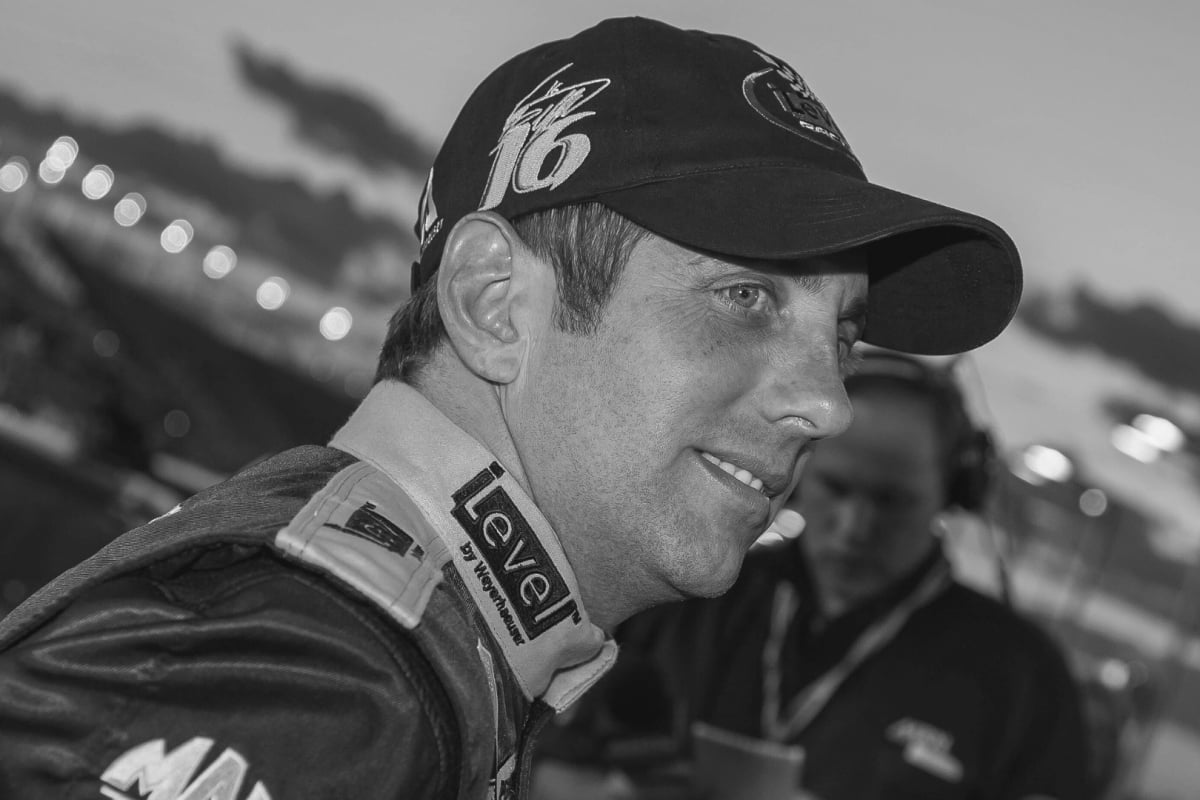 A black and white image of former NASCAR driver Greg Biffle
