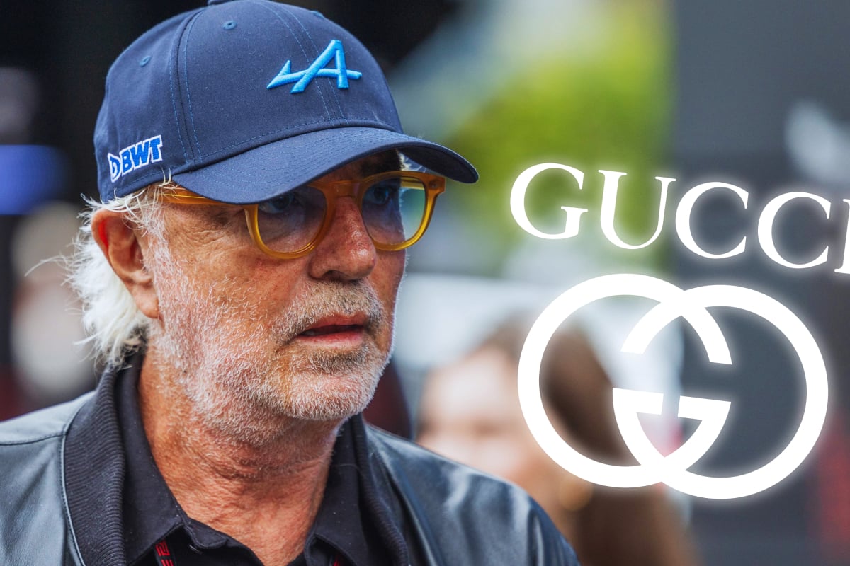 Briatore in an Alpine F1 cap looking concerned with a white Gucci logo edited to the right of his head