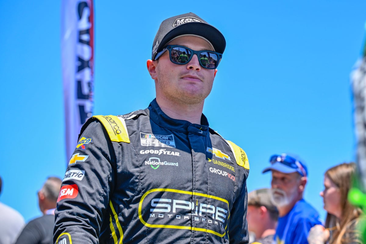 An image of NASCAR driver Justin Haley walking off the track