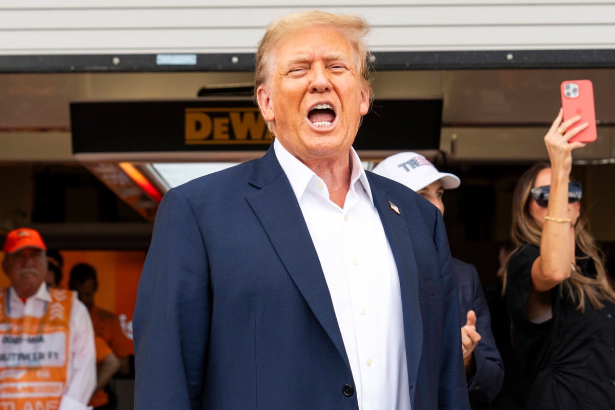 Donald Trump shouts in the McLaren garage at the 2024 Miami GP