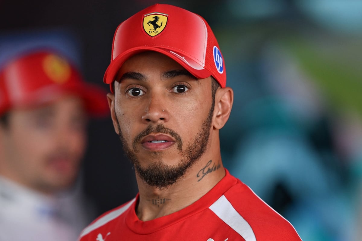 Lewis Hamilton looking shocked at the 2026 Japanese Grand Prix