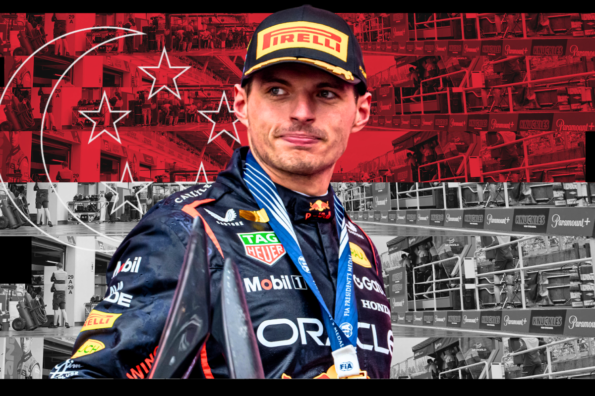 Verstappen smirking in front of a Singapore-themed background