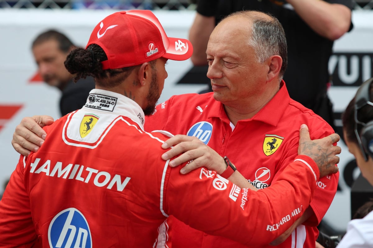 Lewis Hamilton and Fred Vasseur embrace