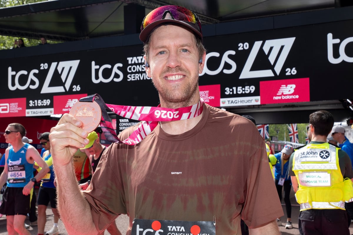 Sebastian Vettel celebrates after competing in the 2026 London Marathon