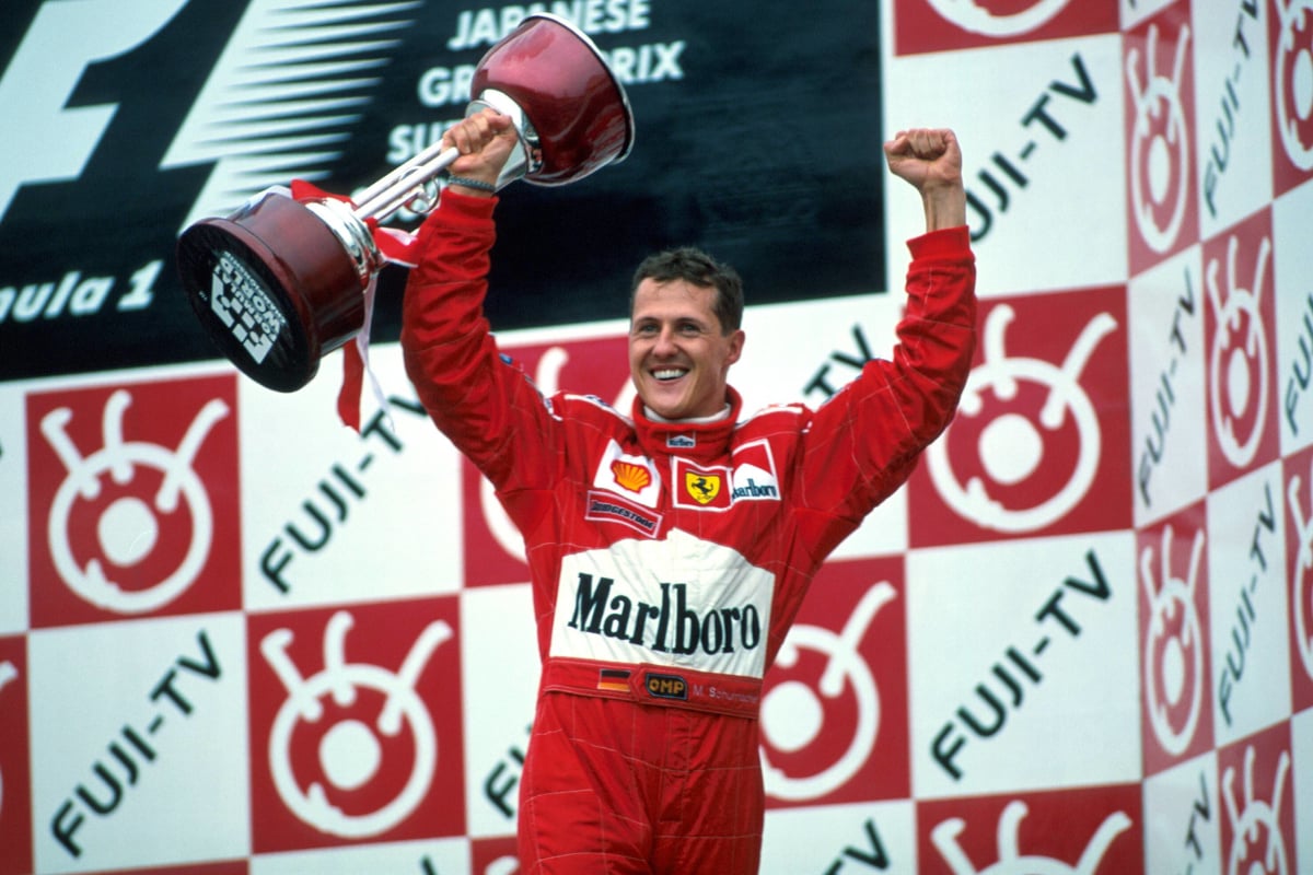 Michael Schumacher celebrates victory at the 2000 Japanese Grand Prix