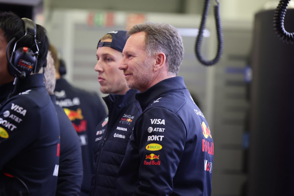 Liam Lawson and Christian Horner in the Red Bull garage