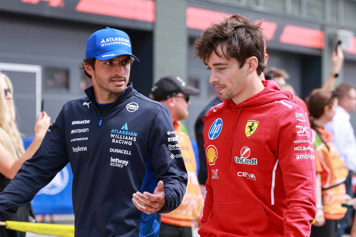 Sainz and Leclerc in the paddock