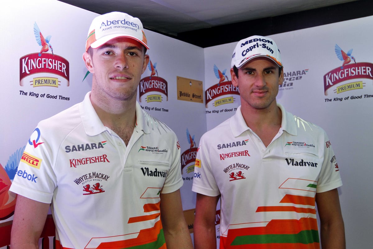 Paul Di Resta and Adrian Sutil pose for a picture in 2013