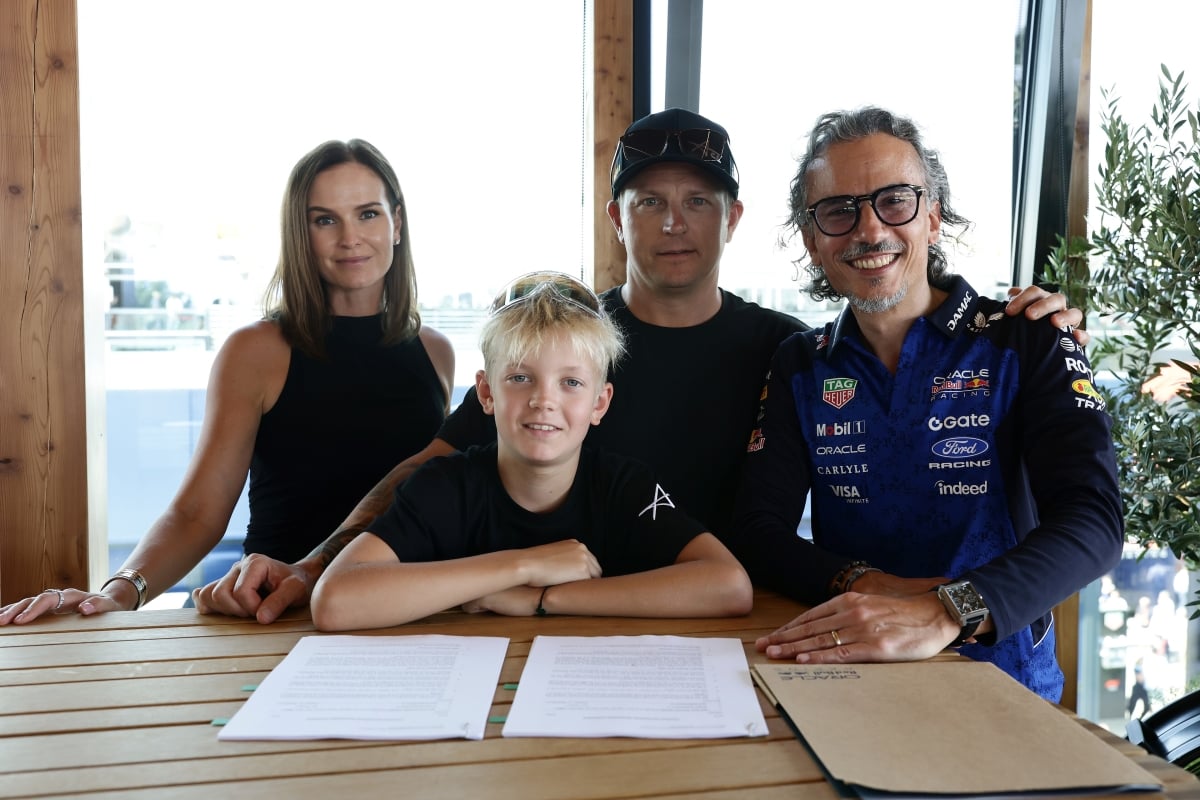 Kimi and Robin Raikkonen with Laurent Mekies and Red Bull