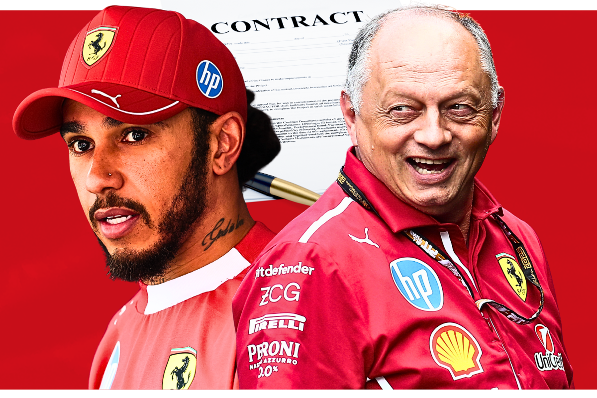 Lewis Hamilton and Fred Vasseur sit either side of a contract with a pen on the table