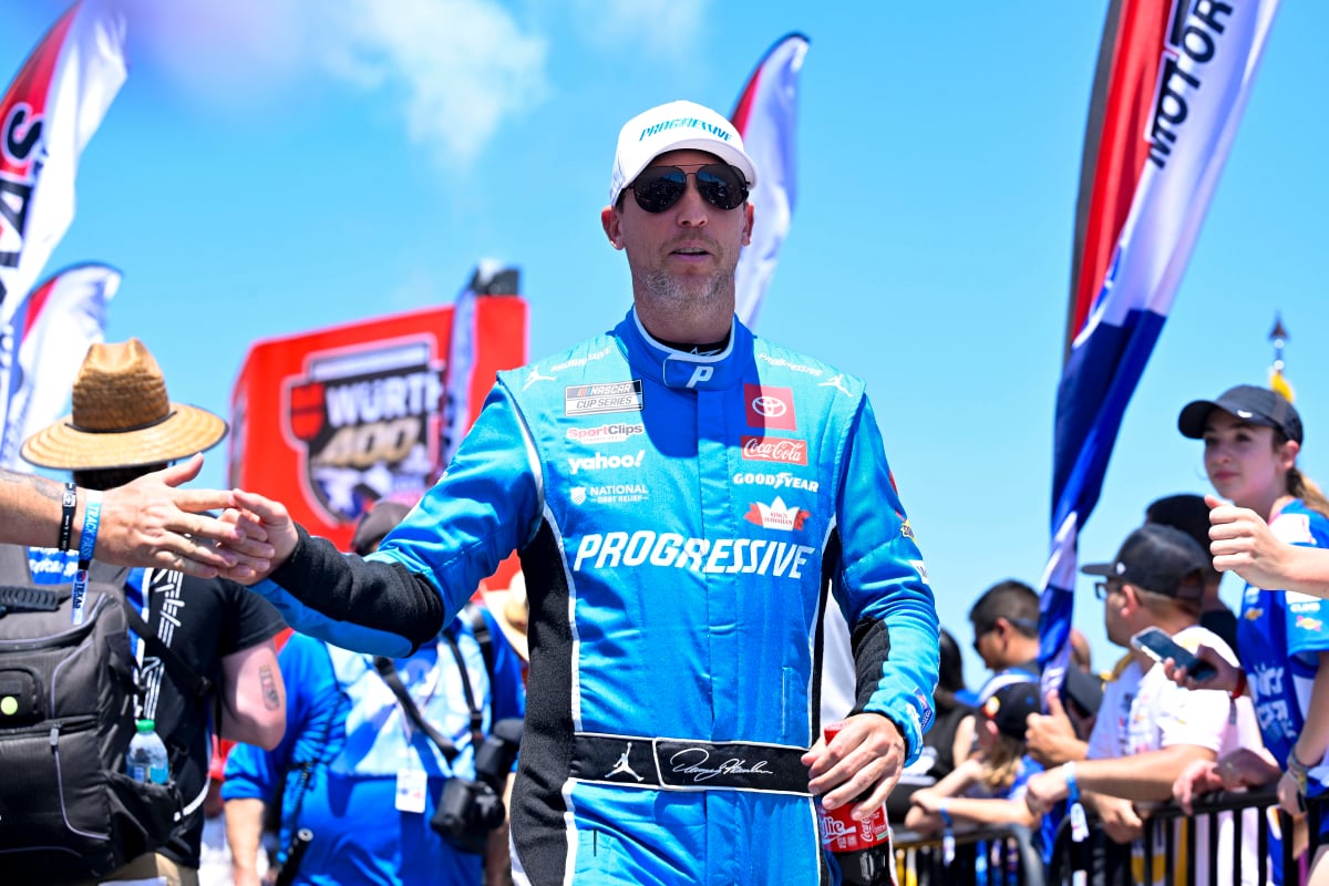 An image of NASCAR driver Denny Hamlin greeting fans