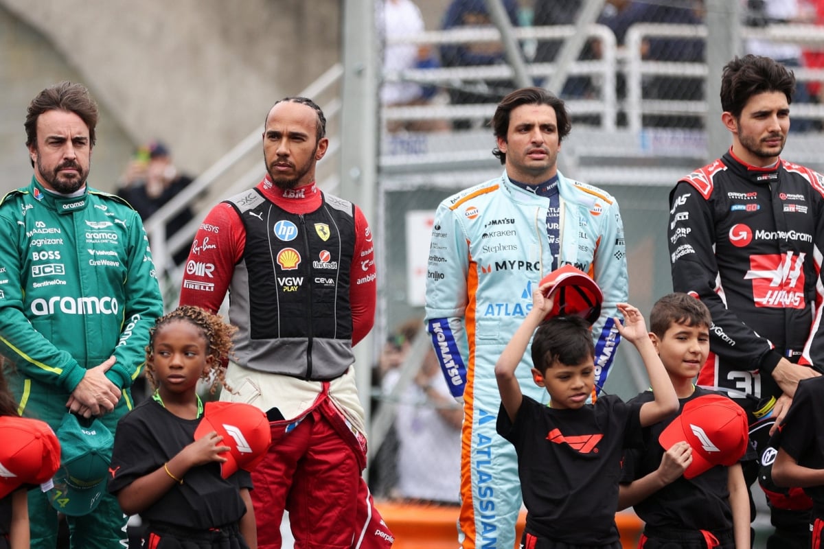 Alonso, Hamilton, Sainz and Ocon stood alongside one another in F1 race suits before 2025 Brazilian GP