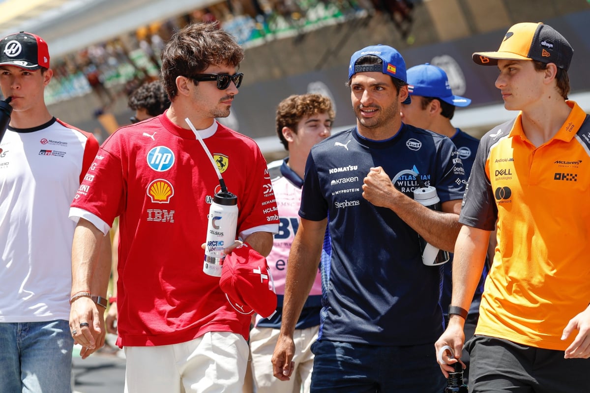 Bearman, Leclerc, Sainz and Piastri walking through the Spanish GP paddock