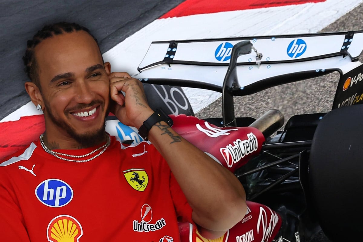 Hamilton smiling and edited in front of a close up of the Ferrari F1 car's rear wing on track