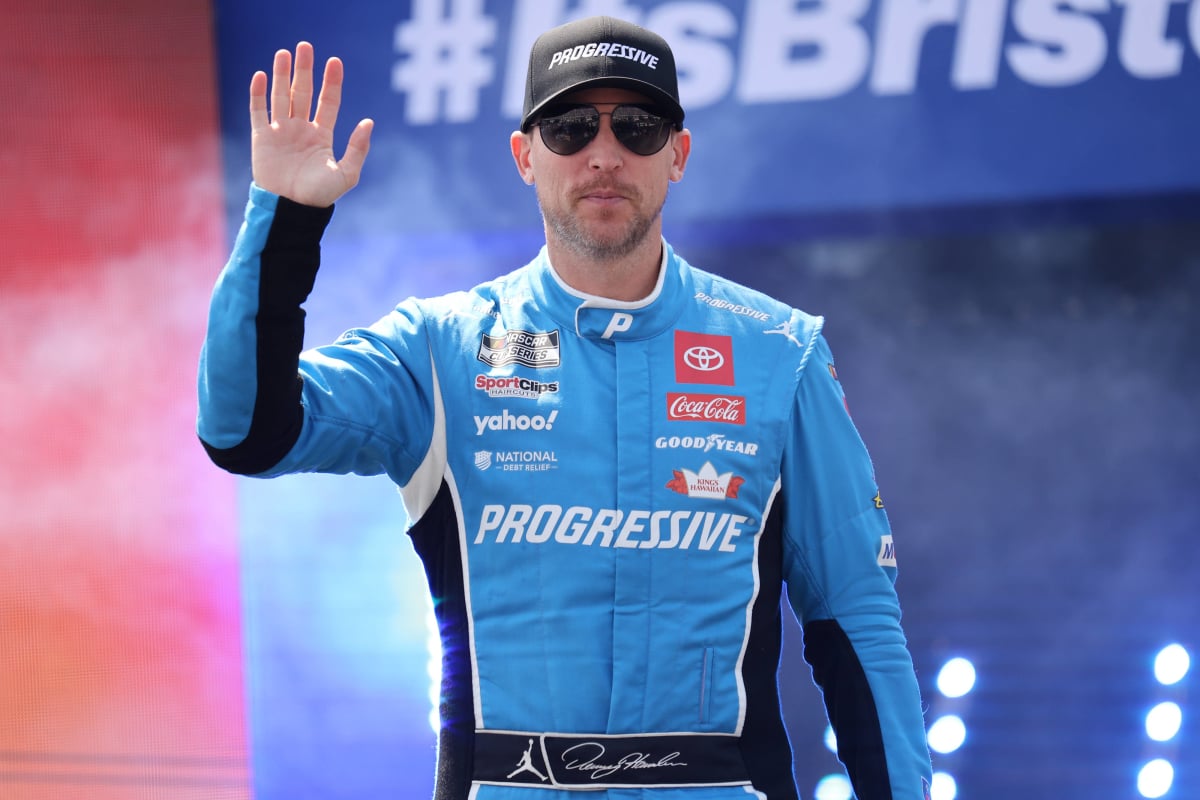 An image of NASCAR driver Denny Hamlin waving
