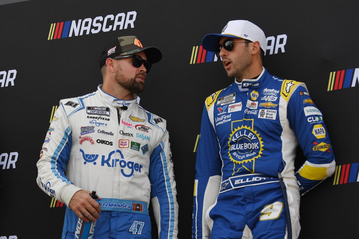 An image of NASCAR drivers Ricky Stenhouse Jr and Chase Elliott in discussion