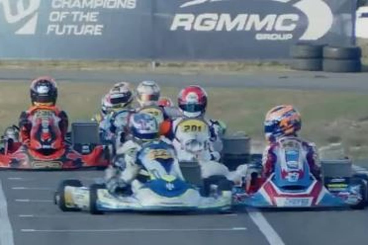 Two racers crash together in a karting race