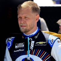 F1 star Kevin Magnussen sets fastest lap on NASCAR debut then tells rival to 'f**k off'
