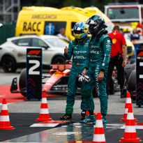 Max Verstappen receives trophy from a bra-less Maria Sharapova in Monaco GP