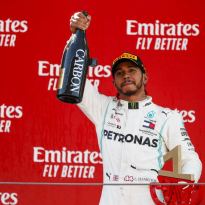 Hamilton dedicates Spanish win to fan with cancer