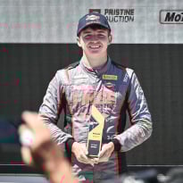 Teenager escapes terrifying fire after race car crash