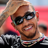 Hamilton and best pal win F1 Christmas cuteness competition