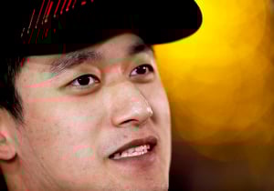 Zhou "speechless" after emotional point-scoring debut