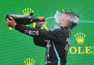 Returning F1 driver filmed falling off surfboard while flying American flag