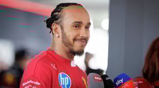 Lewis Hamilton signs superfan’s artificial leg and gets AMAZING surprise