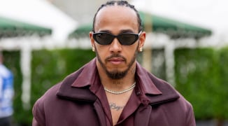 Lewis Hamilton takes a break from F1 pre-season to attend huge fashion show