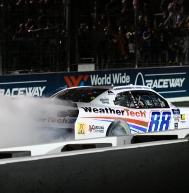 NASCAR driver in scary near miss with on-track cameraman