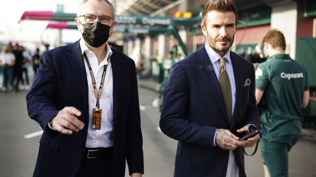 Stefano Domenicali and David Beckham in the paddock