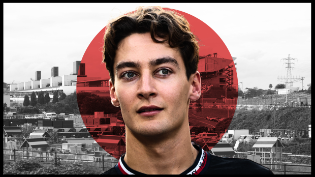 George Russell looks on with the Japan flag in the background — Photo: © IMAGO