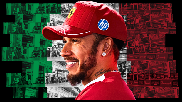 Lewis Hamilton in front of an Italian flag themed background shot of the Italian GP