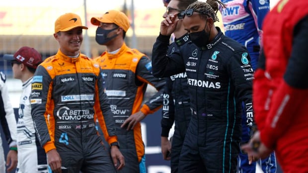 Lando Norris and Lewis Hamilton on the grid