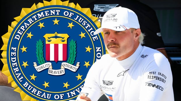 Valtteri Bottas looks across at the FBI logo — Photo: © IMAGO
