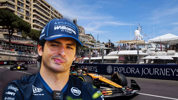 Headshot of Sainz overlooking F1 cars on track at the Monaco GP — Photo: © IMAGO