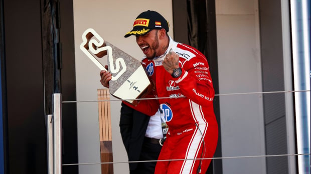 Lewis Hamilton - victorious for the first time in the red car.