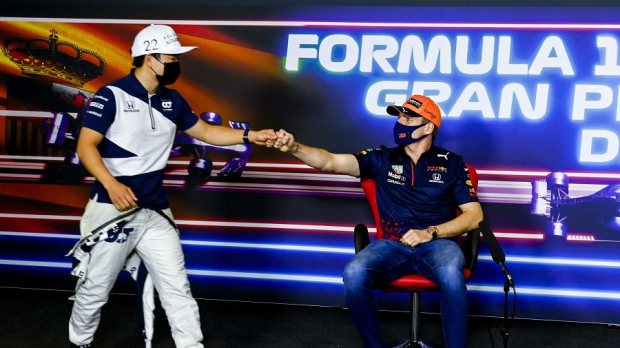 Verstappen and Tsunoda fistbumping during press conference