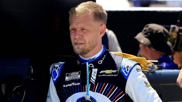 F1 star Kevin Magnussen sets fastest lap on NASCAR debut then tells rival to 'f**k off'
