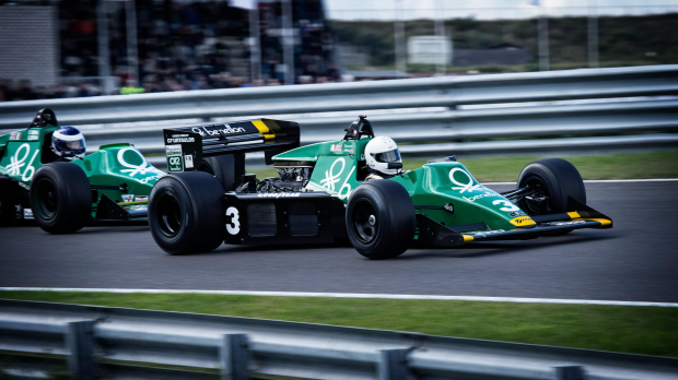 Man riding a racing car