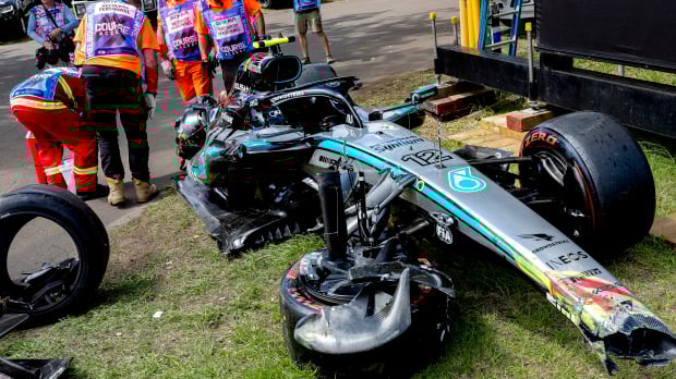Kimi Antonelli's Mercedes lies on the Melbourne grass smashed to pieces after his crash in FP3 — Photo: © IMAGO