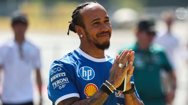Hamilton looking grateful in blue Ferrari kit at Italian GP